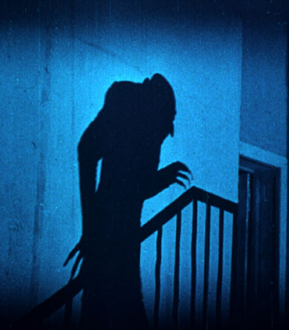 Nosferatu(1923)-Famous image of the vampire's shadow.